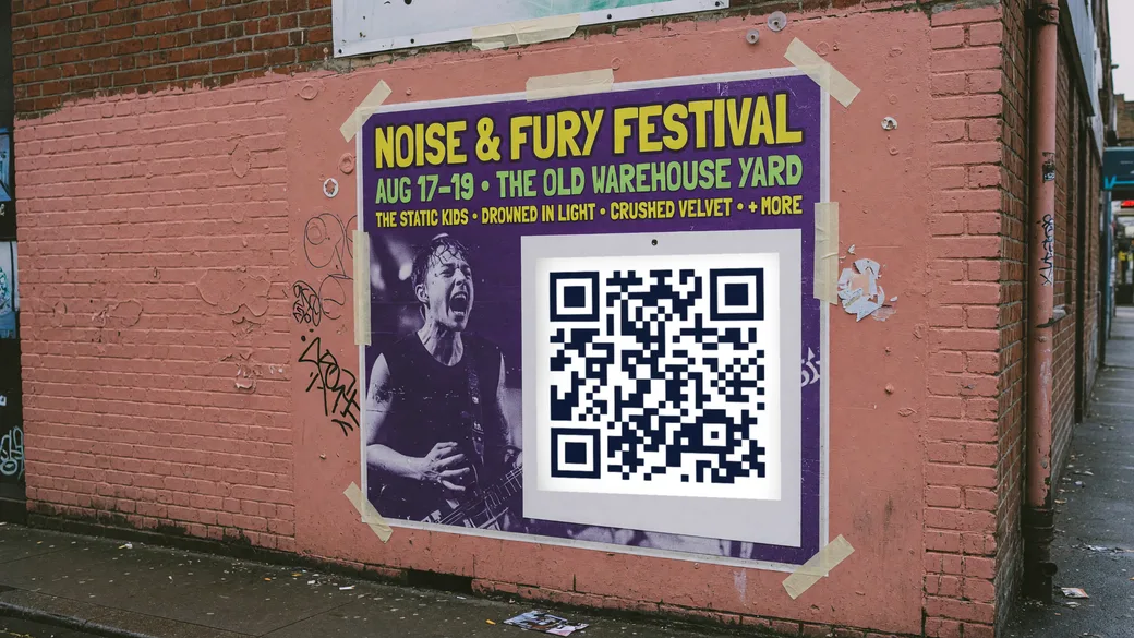 A printed event poster on a wall with a QR code in its lower corner.